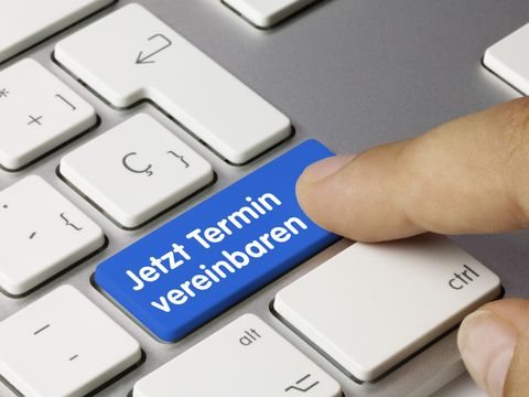 Computertaste mit dem Text "Termin vereinbaren"